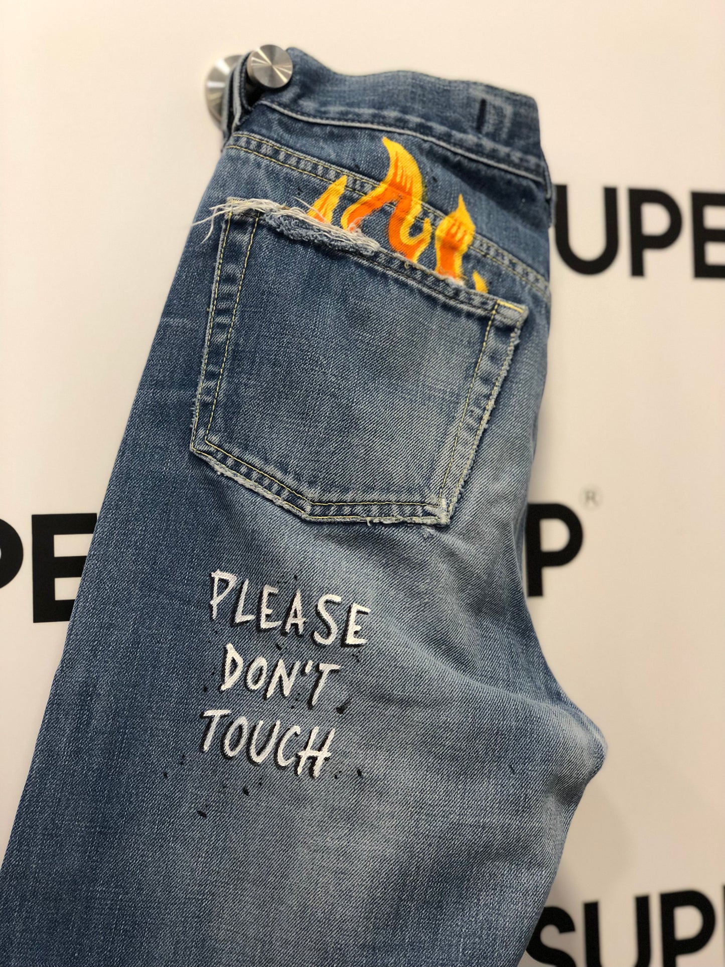 Please Don’t Touch Jeans